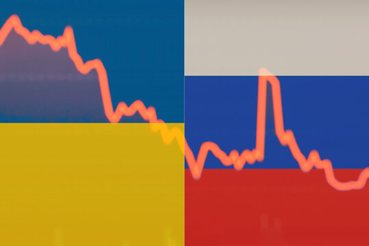Crisis finance curve russia ukraine flags background Investment, marketing crisis concept.Blurred background.