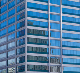 Skyscraper Side View of Reflecting Windows.