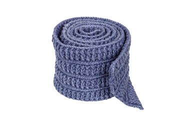 blue knitted wool scarf folded in a roll isolated on white background