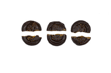 Cookies covered with dark chocolate with nuts, broken in half, isolated on white