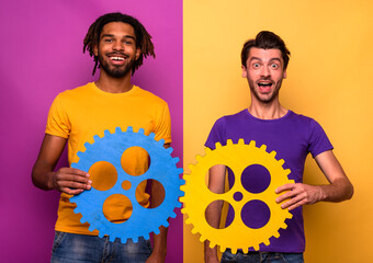 Two men join pieces of gears as concept of teamwork, partnership and integration