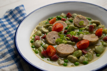 Stew with broad beans, peas and black pudding. Traditional tapas from the north of Spain.
