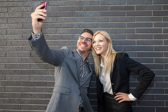 Young business team taking a selfie