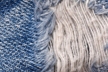 Macro of torn jeans, Denim texture pattern, Close up of ripped threads, Fabric detail background.