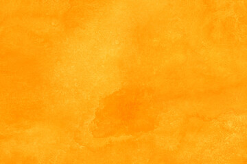 オレンジ色の無地水彩背景