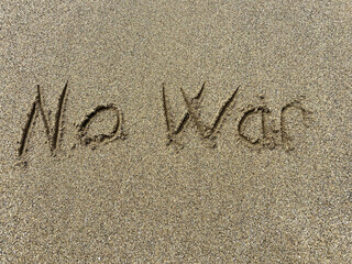 No war on the beach , now war writing sand