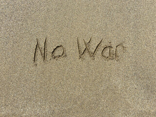 No war on the beach , now war writing sand