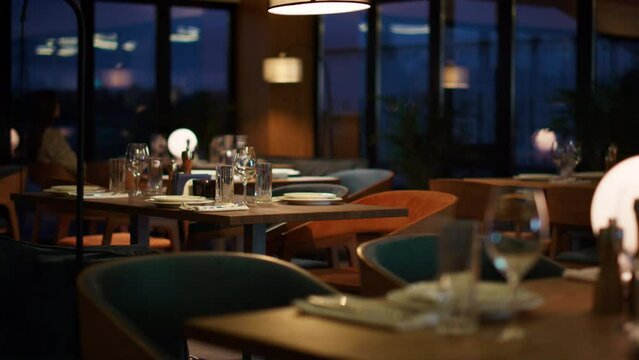 Woman waiting date restaurant at evening. Young lady sitting alone in hotel bar.