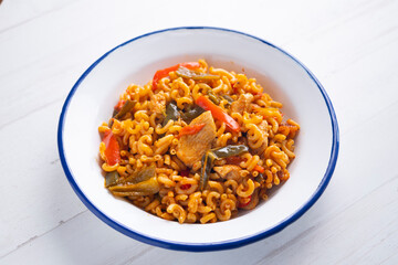 Fideua with chicken and peppers. Traditional Catalan recipe.