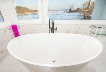 Fototapeta premium soaking tub has been installed with a scenic view