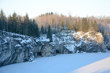 The famous marble quarry in the Republic of Karelia, Russia - Ruskeala quarry on a sunny, cold and winter day
