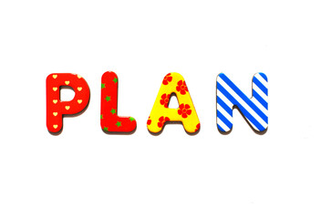 the word plan composed of colorful letters on white background