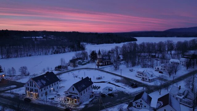 Beautiful aerial view of Monson Maine sunrise beyond town 