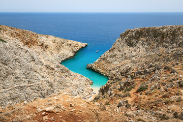 View over tourists enjoying their day on the Seitan Limani beach, Crete, Greece