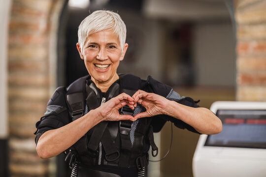 Senior Woman Before EMS Training In The Gym