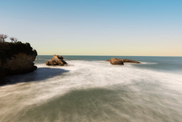 landscape of rocks in the sea long exposure