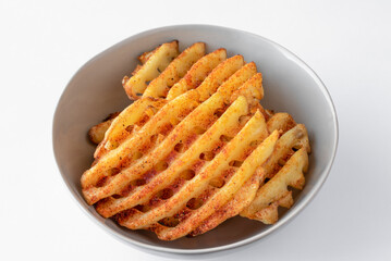 Seasoned Baked Waffle Fries in a Bowl