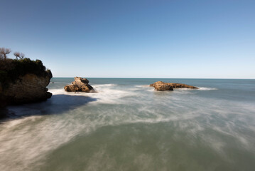 landscape of rocks in the sea long exposure