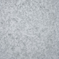 Wet and snowy with water drops and ice glass window at rainy, stormy and snowy day. Concept of seasonal mood, background with copy space.