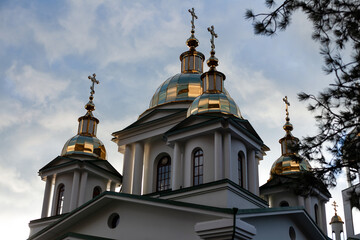 Fototapeta na wymiar Orthodox church against the blue sky