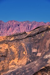 Petroglyphs Rock Paintings St George Utah on Land Hill from Ancestral Puebloan and Southern Paiute Native Americans thousands of years old on Sandstone. USA.