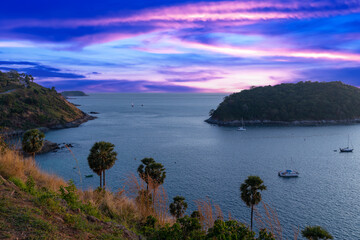 Beautiful and colourful sunset over Naiharn Beach Phuket Thailand