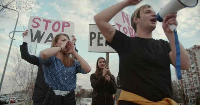 Stop the war, end the war protests with signs to act