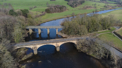 Fototapeta na wymiar An aerial view of the bridges at Crook O Lune near Lancaster in Lancashire, UK