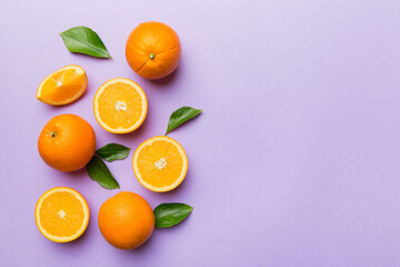 fresh Fruit orange slices on colored background. Top view. Copy Space. creative summer concept. Half of citrus in minimal flat lay with copy space