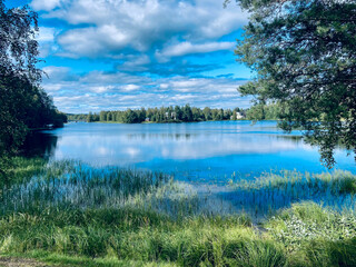 Scenic Landscape with a Lake and Forest in Finland