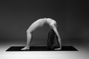 Ear Pressure Pose Wheel Pose Partner. Yoga Posture (Asana)