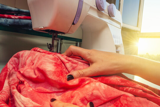 sewing machine by sunlit window with copy space