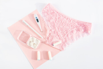 Woman underwear and intimate hygiene products. Concept of menstruation, woman's health, menstrual cycle, virginity, critical days, hygiene protection, pms, pain. Top view, flatly