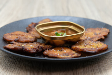 Tasty appetizer of cripsy deep fried plantains to eat before your meal
