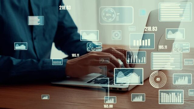 Businessman uses capable laptop computer to analyse business data analytic for marketing strategy and customer relationship management