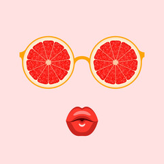 Eyeglasses with slices of ripe grapefruit and lips blowing air kiss