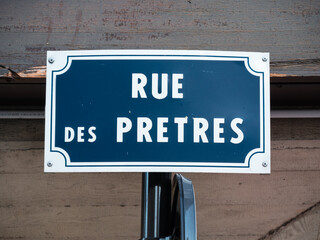Obraz premium Blue sign for Rue des Pretres - Street of Priests in Colmar, France
