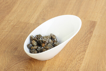 Salted marinated capers snack appetiser
