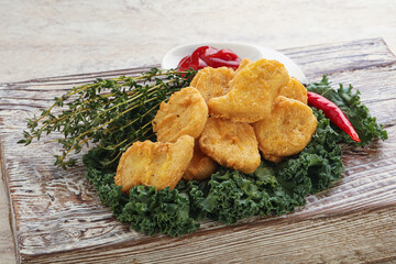 Crispy chicken nuggets with tomato ketchup