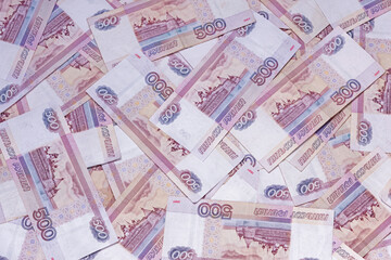 Banknotes of 500 five hundred rubles in a chaotic manner, top view, background