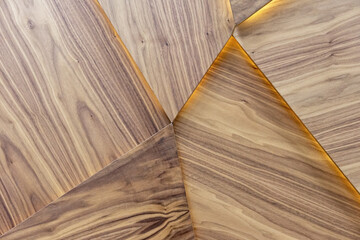 Wooden wall panels with backlight. Background and texture of wood.