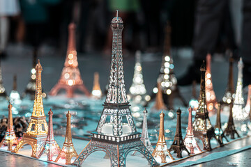 Illuminated models of the Eiffel Tower in Paris