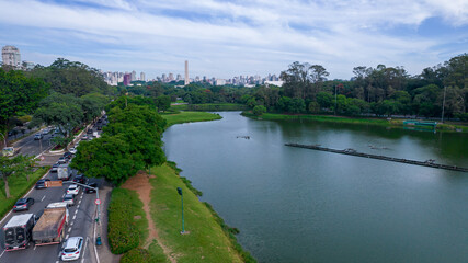 Fototapeta na wymiar Aerial view of Ibirapuera Park in São Paulo, SP. Residential buildings around. Lake in Ibirapuera Park.
