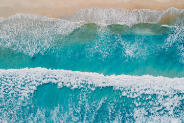 Tropical beach with transparent ocean and waves. Aerial view