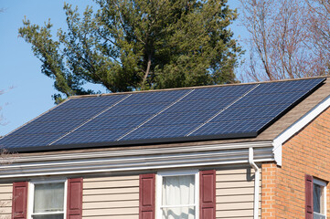 Fototapeta premium Solar panels on a roof of a house