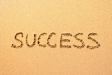 Message success written in the sand. Inspirational positive message background