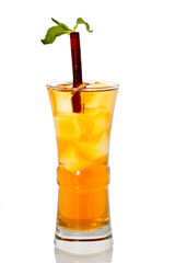 Glass of yellow alcohol cocktail with ice on white background