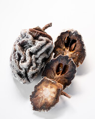 Dried persimmon on a white background. Healthy diet