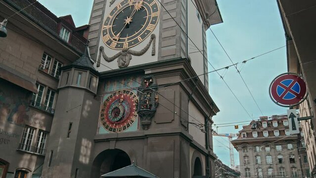 Timelapse of Zytglogge Cultural landmark - a Swiss Mechanical clock tower and astrolabe Clock. Hyperlapse of The architecture of the beautiful medieval Tower with a big clock in Bern, Switzerland.