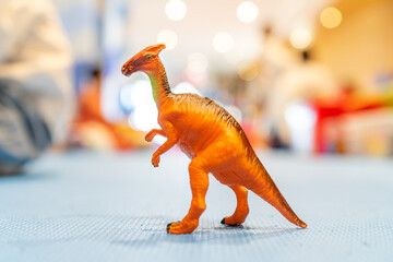Dinosaur toy indoor light with blur bokeh background